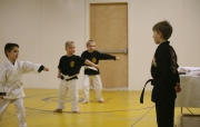 Junior-black-belt-running-test-on-lower-rank-children